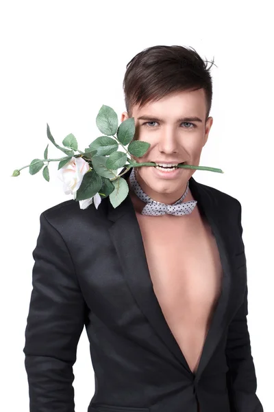 若いハンサムなスタイリッシュなジャケットの男性の花を持つ — ストック写真
