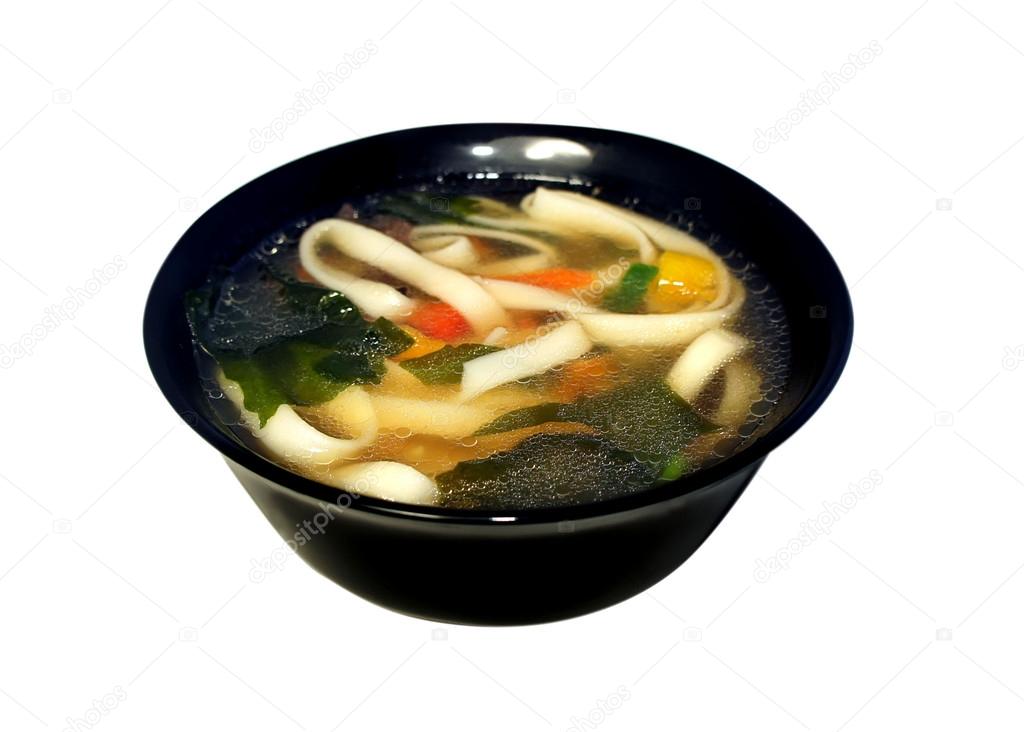 Miso soup with pasta, wakame seaweed, noodles and vegetables