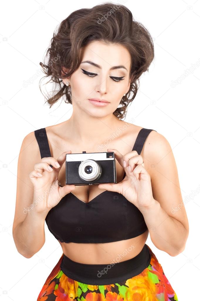 Sexy woman with camera