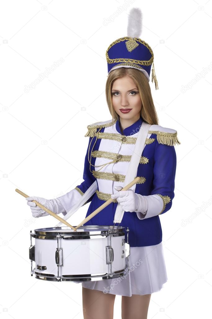 Beautiful blond woman drummer isolated on white background