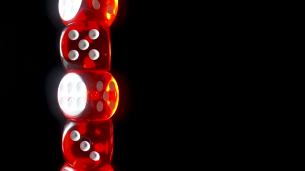 Red dice spinning on an isolated black background. Red cube, craps close up. Gambling background. Space for text or advertising. Concept of playing poker, entertainment. Online casino on the Internet. — Vídeo de stock