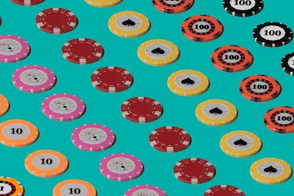 Pattern from casino chips on a green screen chroma key. Rows of casino chips for gambling, poker, roulette. Close up of playing chips for betting in a casino. Money, bet, win, success
