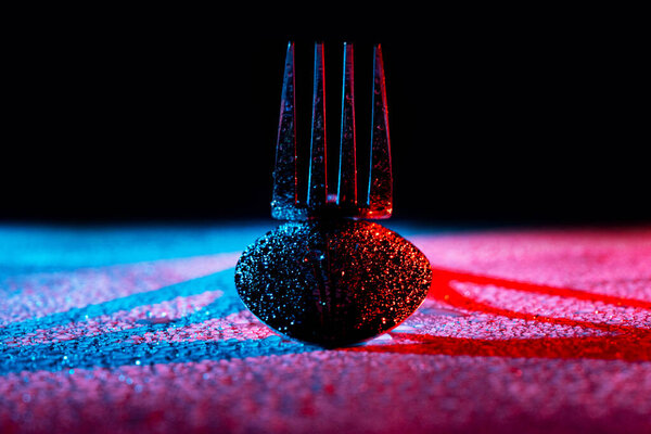 Wet Fork Spoon Lying White Surface Casting Blue Red Shadows Stock Photo
