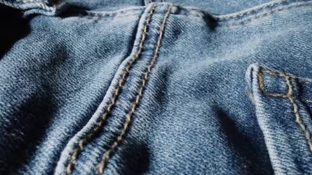 Macro Împușcat Material Blugi Denim Albastru Structura Îmbrăcăminte Material Textil — Videoclip de stoc