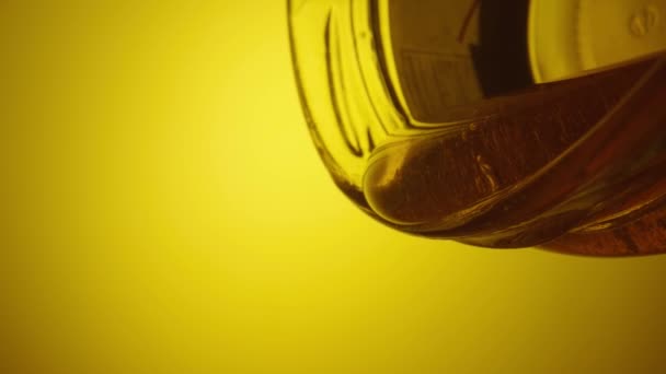 Stream Golden Thick Honey Spills Yellow Background Sweet Honey Molasses — стоковое видео