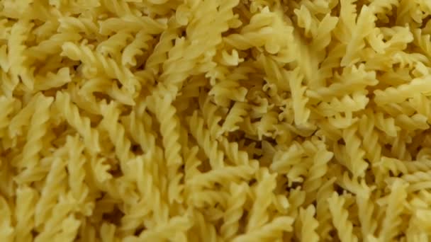 Spiral Pasta Spilling Pile Dry Macaroni Production Italian Pasta Factory — Stock Video