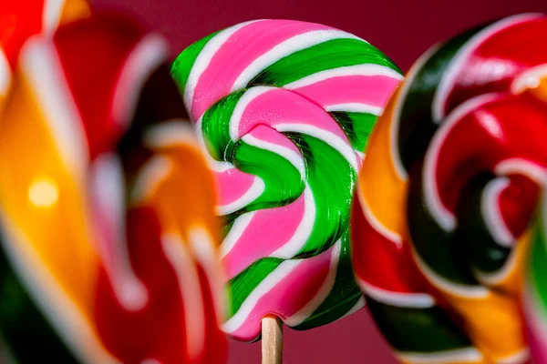Twisted Pink Green Caramel Lollipops Pink Background Colored Assorted Sweet — Photo