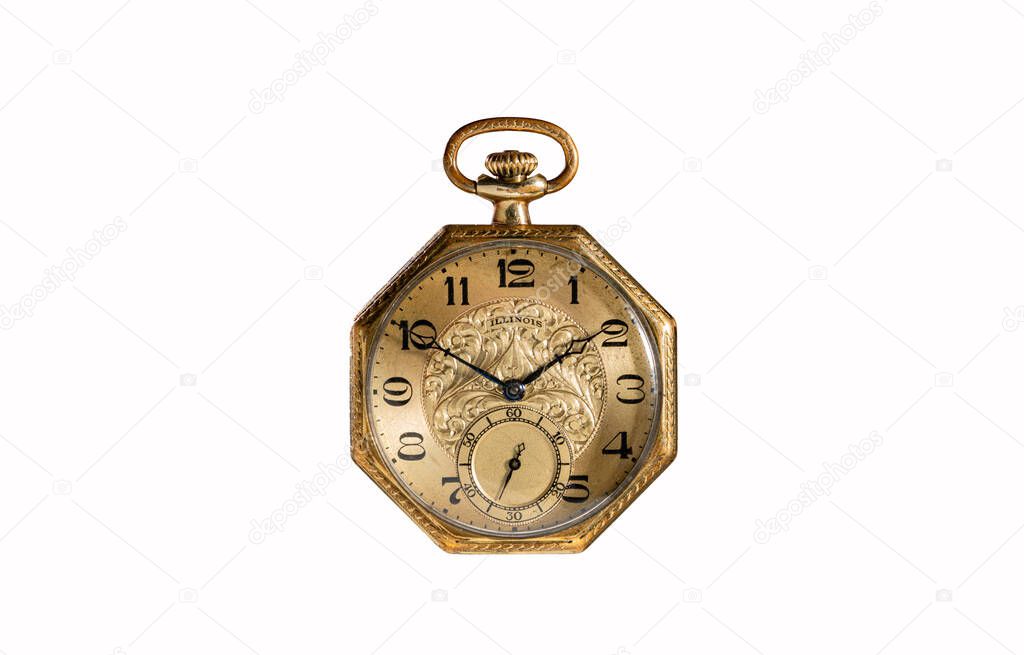 Golden mechanical antique pocket watch on white isolated background. Retro pocketwatch with second, minute, hour hands and numbers. Old octagonal clock with dial for gentleman. Luxury aged chronometer