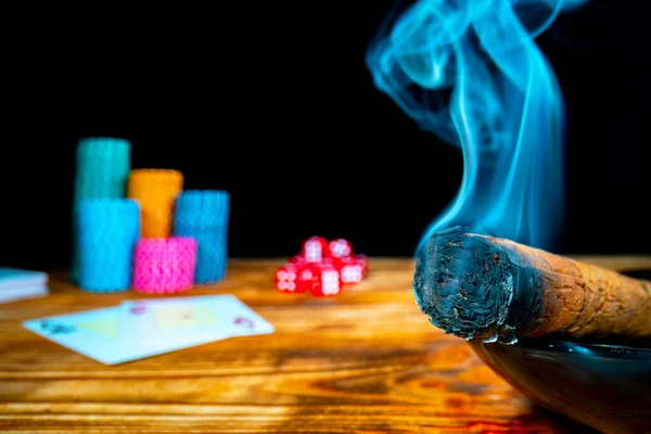 Smoking Cuban Cigar Backdrop Casino Chips Cards Dice Lying Wooden — Stockfoto