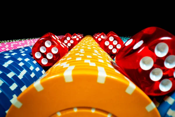 Vertical Rows Colored Casino Chips Many Red Dice Isolated Black — Stock Photo, Image