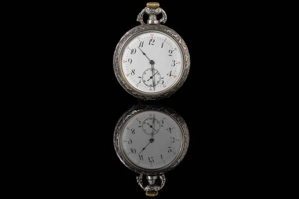 Silver Mechanical Antique Pocket Watch Reflecting Surface Black Isolated Background — Zdjęcie stockowe