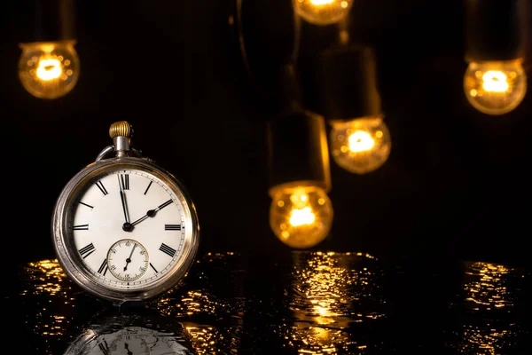 Silver Retro Pocket Watch Black Background Garland Glowing Lightbulbs Antique — Fotografia de Stock