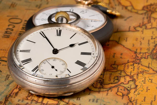 Two Silver Retro Pocket Watches Lying Old Paper Map World — Fotografia de Stock