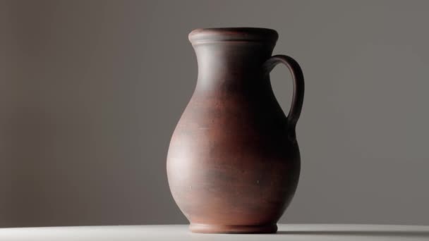 Brown Earthenware Jug Handle Spinning Dark Studio Old Jar Clay — Wideo stockowe