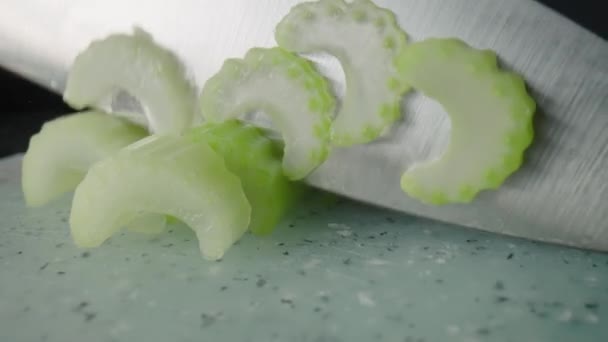 Male Hands Cutting Celery Stalks Knife Small Slices Pieces Juicy — Vídeo de stock