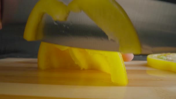 Hands Man Knife Slicing Yellow Sweet Pepper Semiring Process Cutting — Stock Video