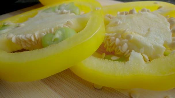 Sliced Rings Fresh Raw Yellow Bell Peppers Wooden Board Sweet — Stockvideo