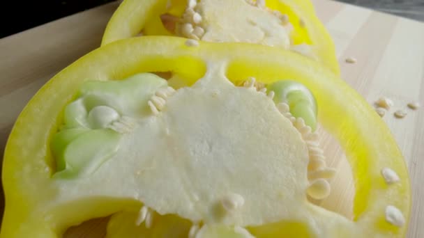 Sliced Rings Fresh Raw Yellow Bell Peppers Wooden Board Sweet — Stockvideo