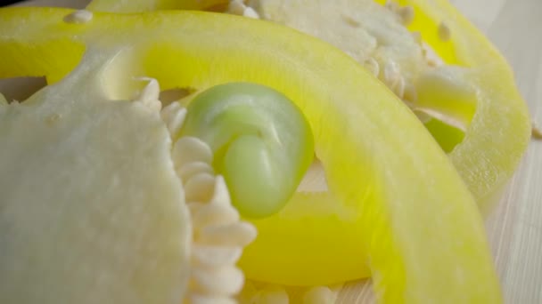 Sliced Rings Fresh Raw Yellow Bell Peppers Wooden Board Sweet — Stockvideo