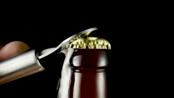 Macro Shot Hand Metal Opener Uncorking Glass Bottle Cap Opens — Stockvideo