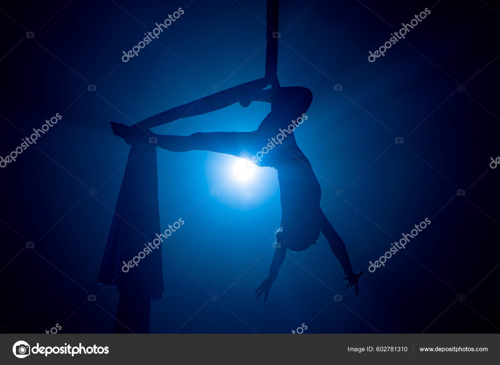 Young Woman Performing Circus Aerial Silk Dark Blue Light Silhouette —  Stock Photo © KinoMasterDnepr #602781310