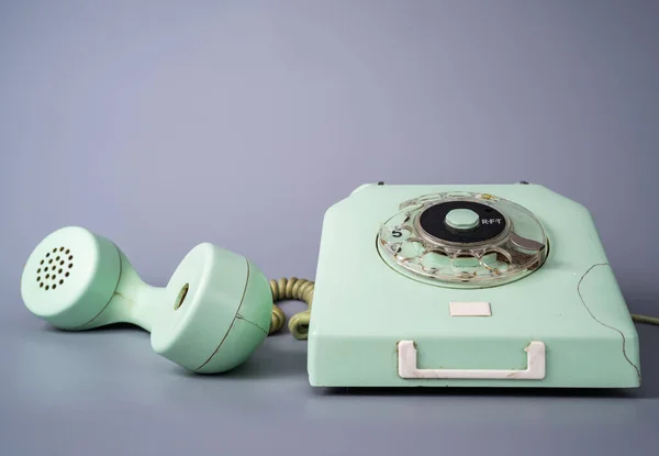 Old Blue Rotary Telephone Twisted Cord Gray Background Retro Landline — 스톡 사진