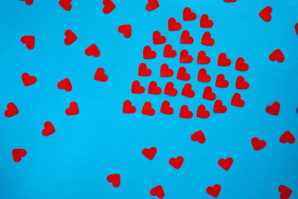 Pattern Red Paper Hearts Laid Out Shape Heart Blue Screen — Φωτογραφία Αρχείου