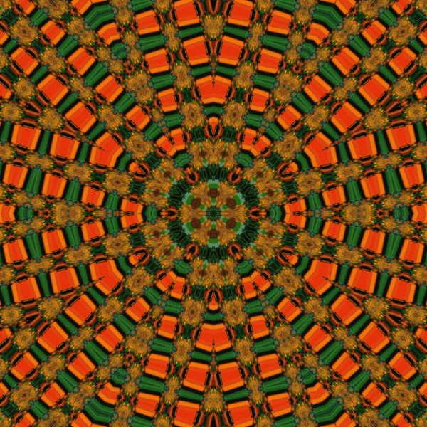 Яркий зеленый и оранжевый цветок мандалы — стоковое фото