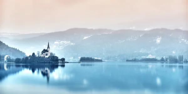 Dreamy church maria-Wörth on island in lake wörthersee