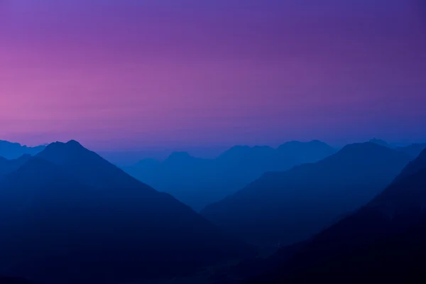 Silhouette of tyrol mountains at sunrise — Stock Photo, Image