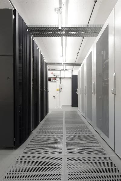 Small air-conditioned computer server room environment with racks — Stock Photo, Image