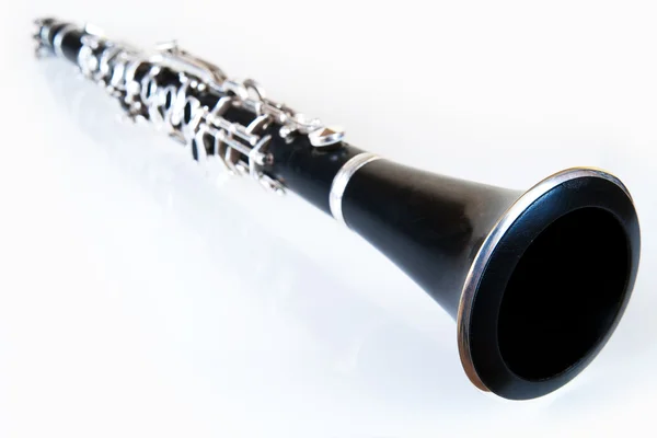 Perspective of a black classic music clarinet with silver environment — Stock Photo, Image