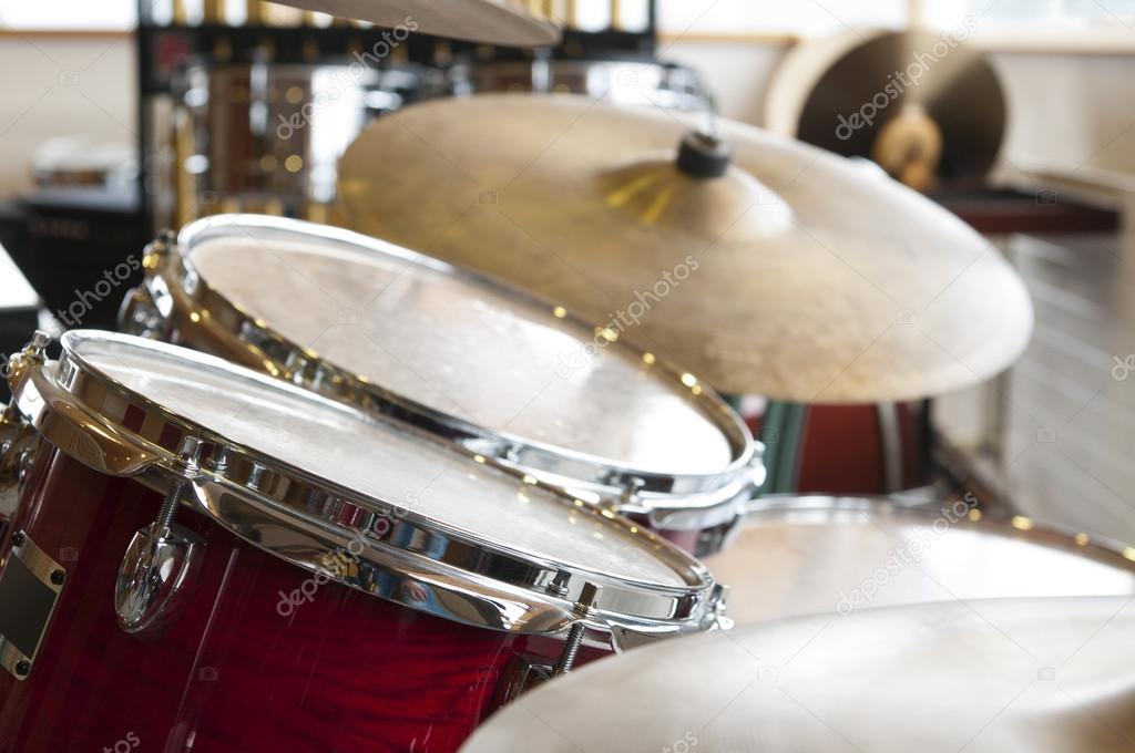 View on two drums and plates kit with wood visual apperance