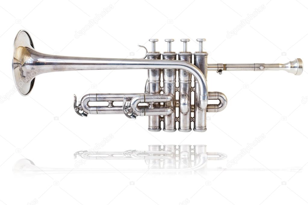 Silver golden piccolo trumpet four valves isolated background