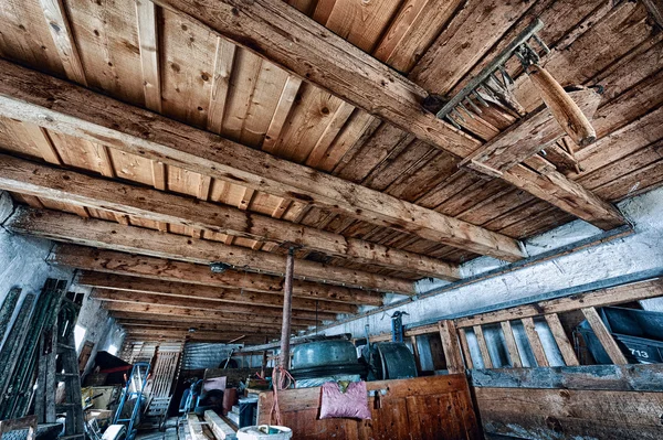 Old farm storage room with junk — Stock Photo, Image