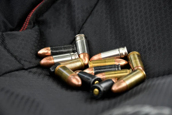 9Mm Pistol Bullets Black Leather Floor Soft Selective Focus Concept — Stock Fotó