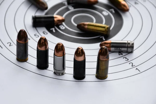 9Mm Pistol Bullets Black Target Shooting Paper Soft Selective Focus — Foto de Stock