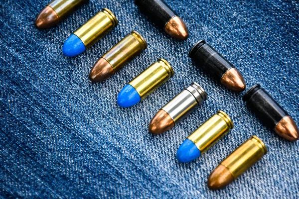 9Mm Pistol Bullets Blue Jeans Soft Selective Focus Various Bullets —  Fotos de Stock