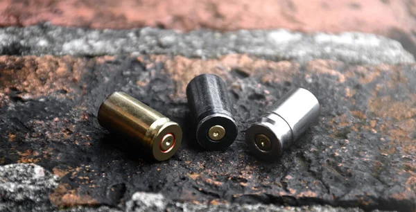 9Mm Pistol Bullets Bullet Shells Brick Floor Soft Selective Focus — Foto de Stock