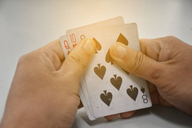 Card playing, soft focus, relaxing activity and hobby concept.