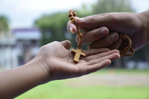 Closeup Hands Which Offering Wooden Cross Bead Rosary Other People — Stock Photo, Image