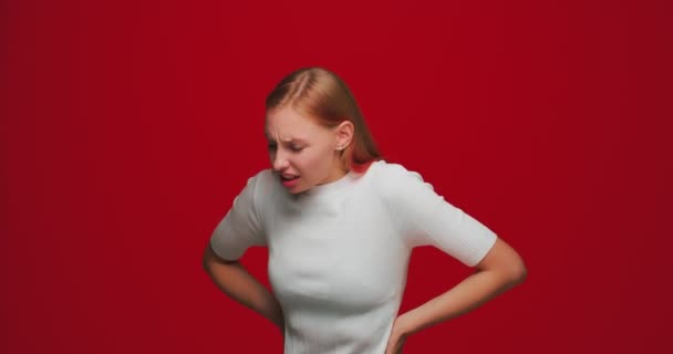 Backache, unhealthy girl touch injured sore back, suffer lower lumbar ache, muscle pain of overwork, pinched nerve — Stock Video