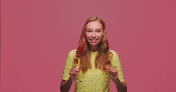 Holiday celebration. Young girl congratulate clink glass of champagne wine to camera, have fun, celebrate festive event — Stock Video