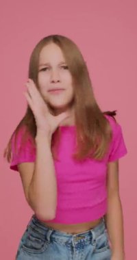 Vertical video cool child girl dancing, cool moving, recording content for social network. Contemporary dance school ad