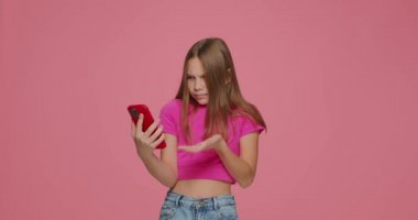 Angry child girl annoyed by slow internet, spam message, broken phone, troubles with app, connection to wifi