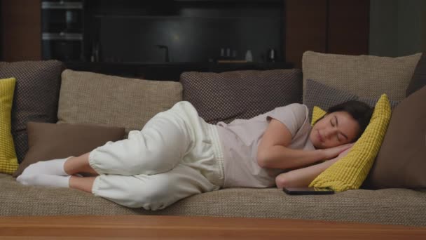 Tired Young Woman Napping Couch Checks Social Media Messages Phone — Stock Video