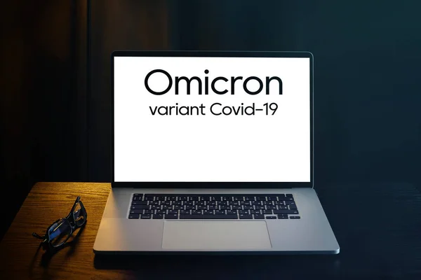 Omicron Variant Covid Laptop Stockafbeelding