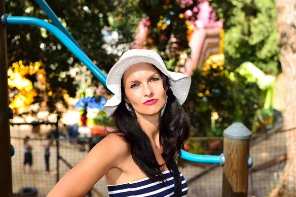 Young woman enjoying in an adventure park — Stock Photo, Image