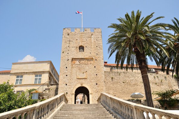 Tower with entrance staircase to the old town. Korcula, Croatia