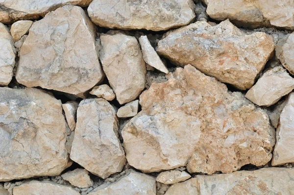 Textur der Steinmauer für den Hintergrund — Stockfoto